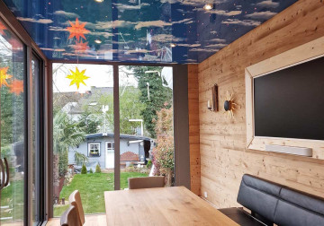 Lackspanndecke im Wintergarten mit Wolken und Sternenhimmel